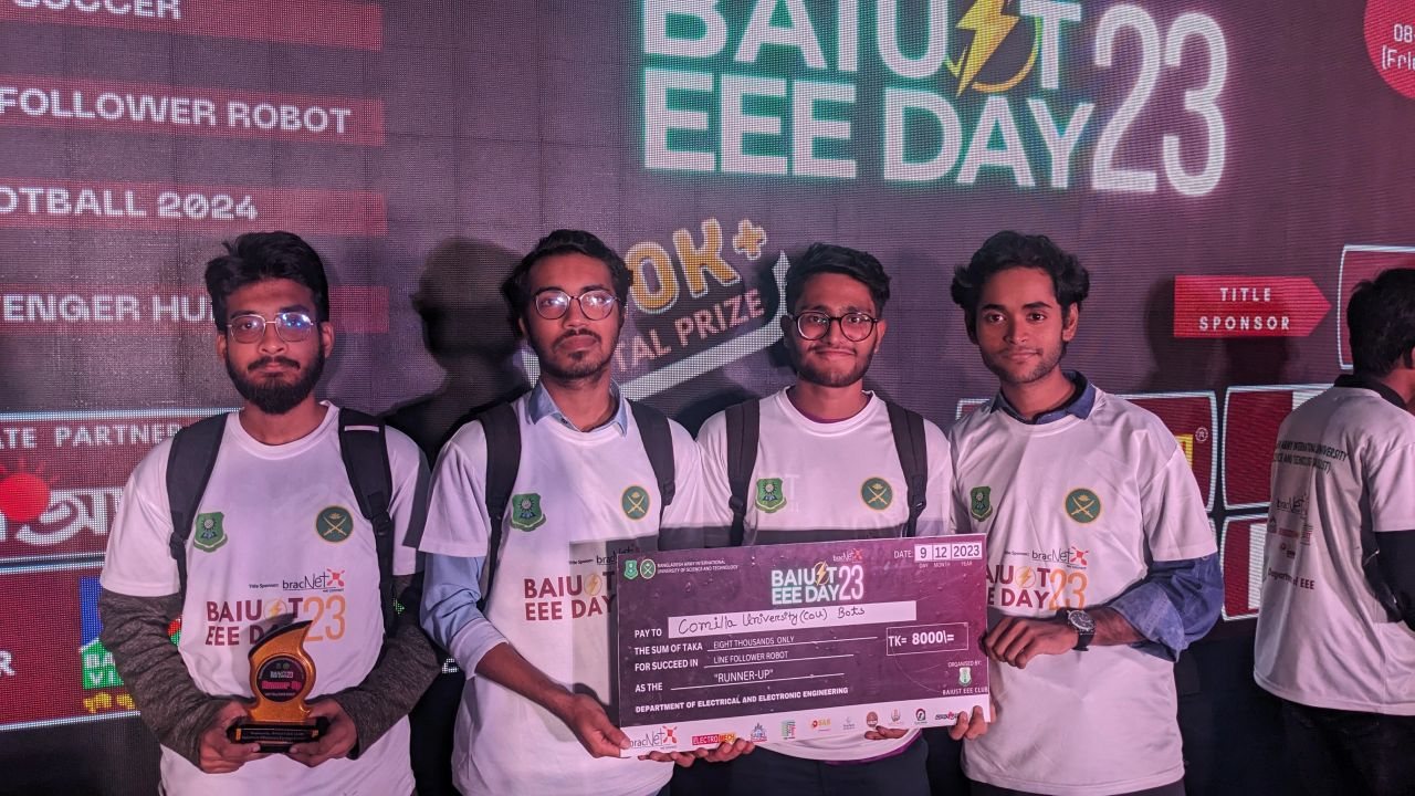 The CoU Bots team with the runners-up prize at BAIUST EEE Day '23