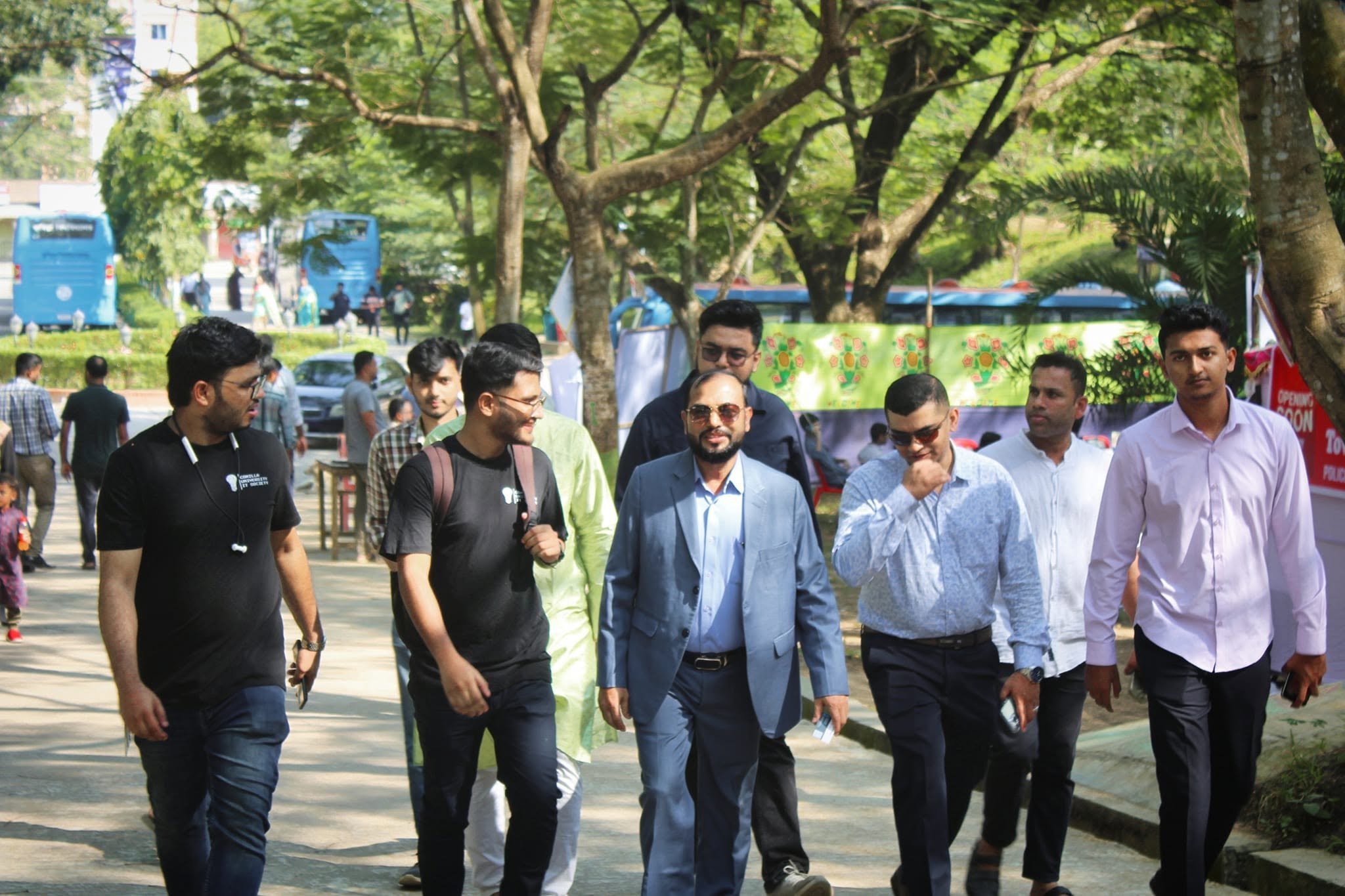 Walking with faculty and guests at the Comilla University IT Fest 2024